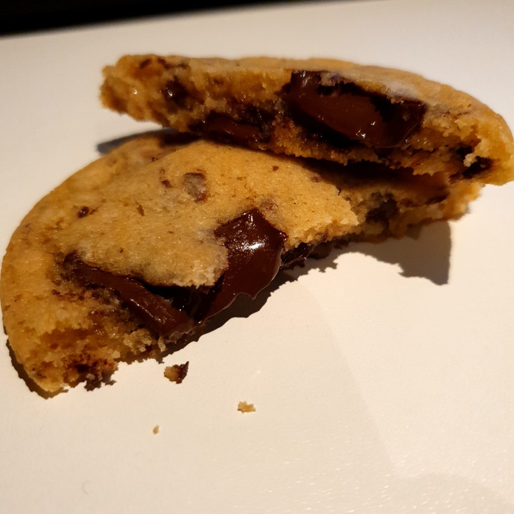 Freshly baked chocolate chip cookie