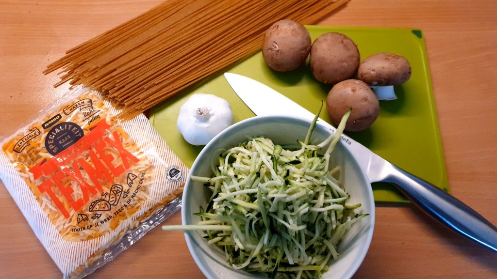 some ingredients for mushroom and cheese spaghetti